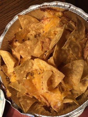 "Masterpiece" nachos!  No sour cream...no guacamole...no salsa...no jalapeños...and no scallions!  No masterpiece, just chips and cheese!!