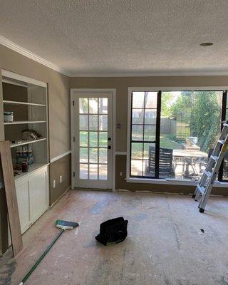 Added popcorn ceiling and painted walls