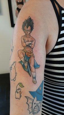 Vegeta (nickname for my daughter, before she was known to be a girl) and 82nd Airborne (Grandfather) fusion tattoo.