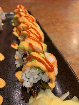 Tsunami Roll - broiled eel & jalapeno roll with shrimp & avocado, topped with spicy mayo & sriracha sauce