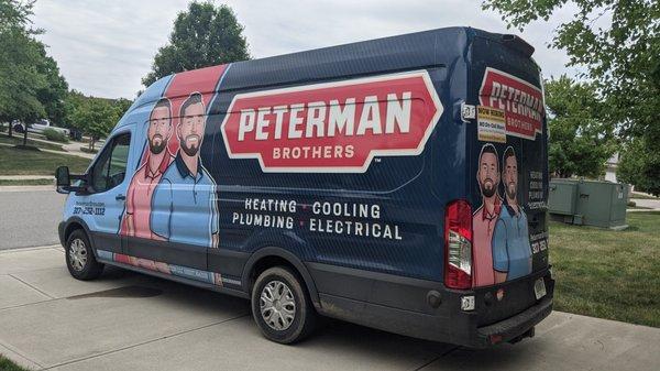 Peterman van in my driveway installing my new furnace and air conditioner Just 14 hours after I signed on the dotted line!