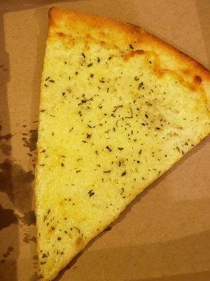 Slice of white pizza