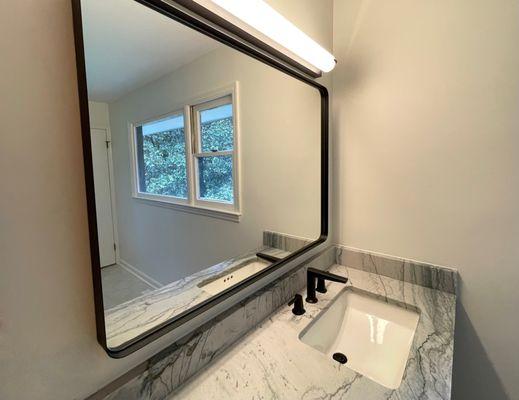 Mid Century Modern design for this newly remodeled primary bath