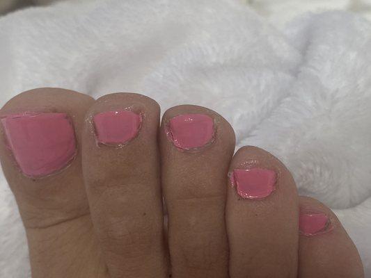 Uneven paint job, lumpy and paint all over my toes.