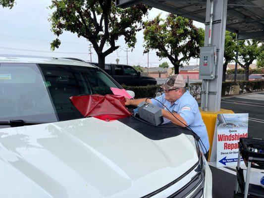 Eddie working on our windshield