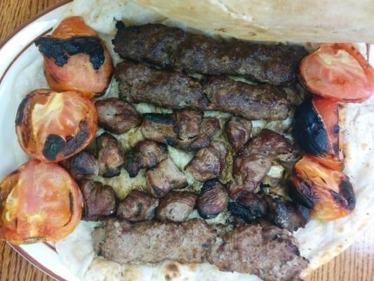 Shish kabab and lamb kabab which are the same as Persian Koobideh and Chengeh served with fresh hot Naan. This is awesome.