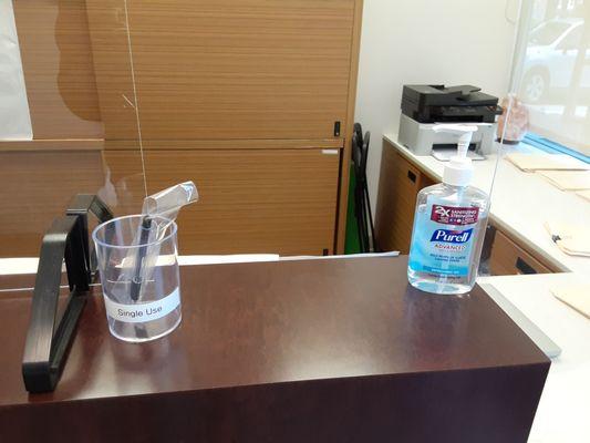 Sanitizer and one-time pen.