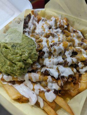 Al pastor fries with everything - added salsas after taking the photo.