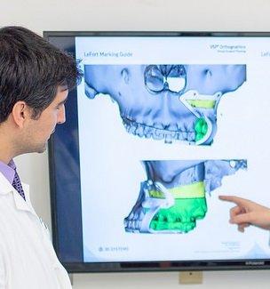 Dr. Sohail Saghezchi viewing a CT scan