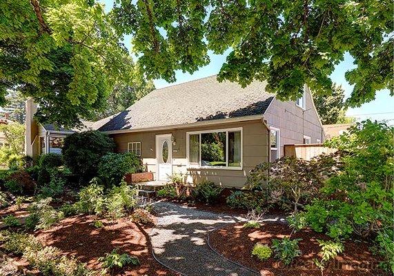 N. Willamette Ave. Cape Cod in the coveted Overlook neighborhood. Corner lot with a big, detached garage & gorgeous shade trees.