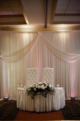 Sweetheart chairs and back drop