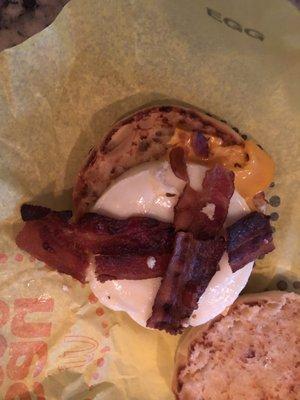 Crappy bacon on my muffin. The food always looks this bad.