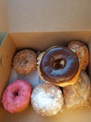 Various cake donuts, buttermilk glazed, buttermilk maple, risen chocolate iced