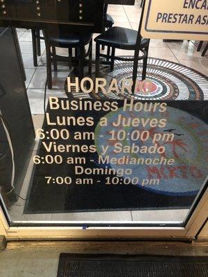 Front door with hours