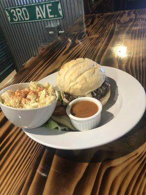 One pound Cowboy burger with homemade potato salad.