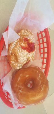 5 bucks for 2 donuts. The red jelly one is a Buttermilk Crown, then a regular glazed donut