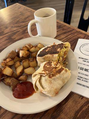 Breakfast Burrito, with scrambled eggs, bacon, peppers, onions and shredded cheese in a flour tortilla