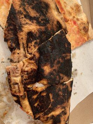 Pizza burnt black and inedible!  It all went into the trash. Do not order delivery!