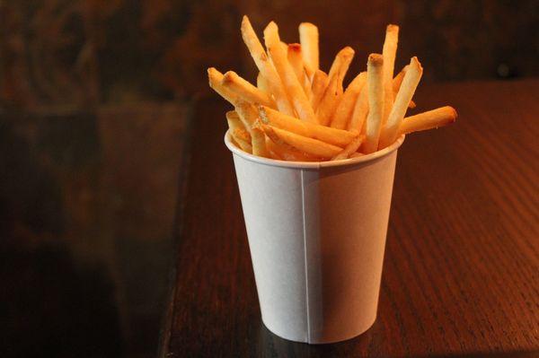 Traditional thin cut skin-on French Fries.