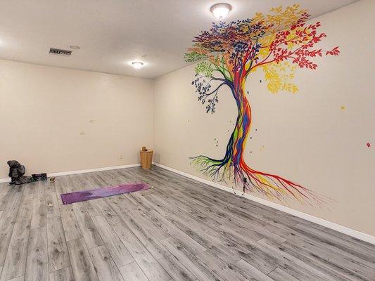 Yoga and meditation with the tree of life back drop.