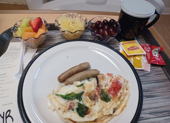 Egg white omelet with sausage and fruit