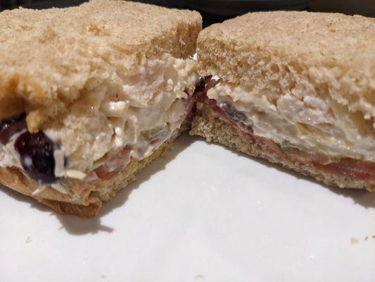 Chicken salad on honey wheat with tomato