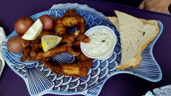 Frog legs, red potatoes, Cole slaw, bread.