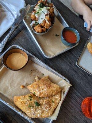 Cheeseburger empanadas and garlic bread cheese curd