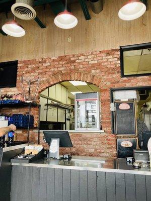 Cashier has view of kitchen