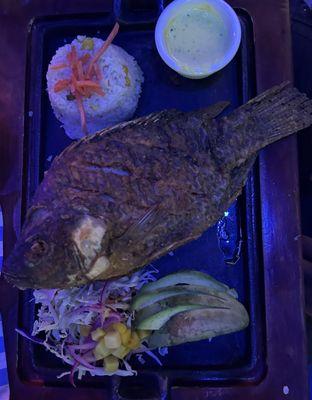 Mojarra seasoned with lemon pepper and garlic paste., con white rice n salad