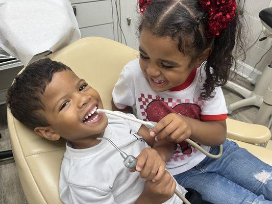 I think we might have a future dentist on our hands! How cute is this brother/sister duo?