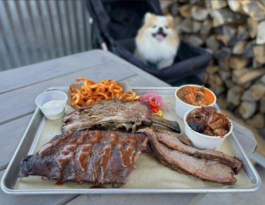 Baby Back Ribs (1/2 rack-$24), Dino Beef Rib ($40), Brisket (1/2 lb-$18), Burnt Ends (S-$12), Curly Fries (S-$8), Beans + Greens (S-$8)