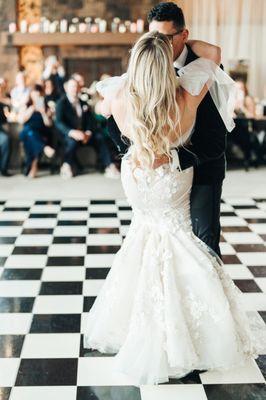 Elevate the romance of your wedding dance by adding a graceful dip and a tender kiss.