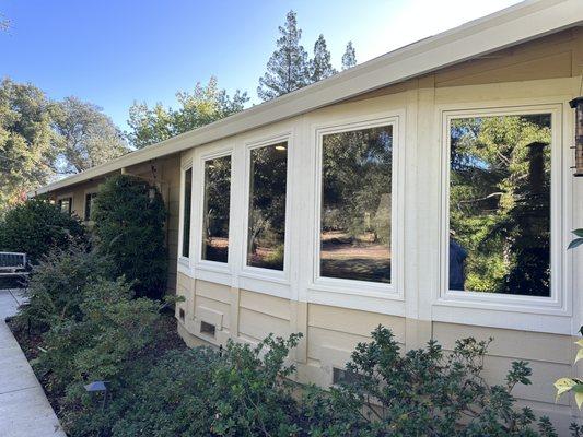 Milgard: White Vinyl Retro Fit windows.