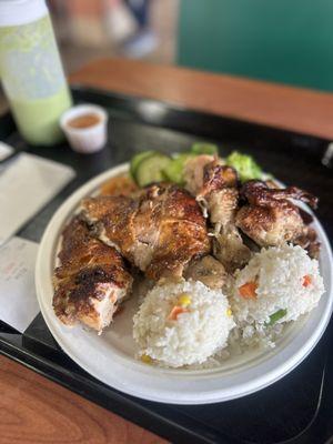 Half chicken, rice and salad