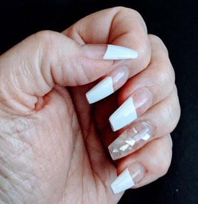 Coffin shaped, NY French Manicure with a crystalized design on each ring finger.