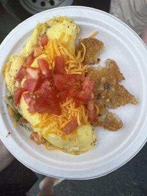 Omelette with onions, peppers, tomatoes and cheese