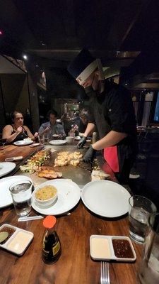 Chef Gabriel cooking our lobsters and shrimps along with veggies. Everything was delicious!