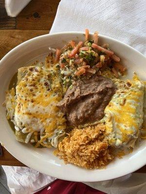 Combo plate: 2 cheese enchiladas with green sauce, 1 vegetarian tamal with jalapeño cream sauce, refried beans (no lard!) and Mexican rice.