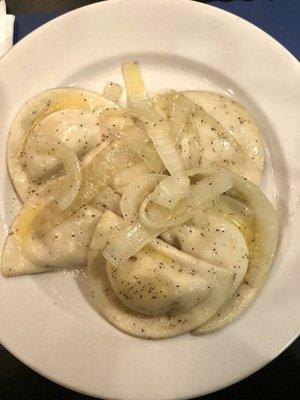 Perogies- boiled covered in butter and topped with onions. So good