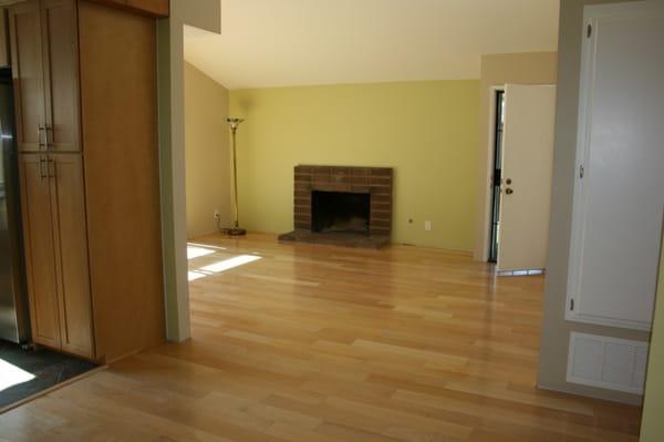 Finished installation before baseboards. Glued down engineered natural maple from Urban floors