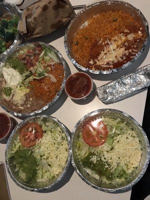 2 of 3 meals we ordered, the two salad looking dishes are JUST the lettuce, pico de gio, cheese, guac & rice that came with both meals.