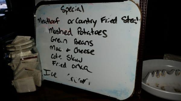 Thursday Lunch Specials meat and three. . The last item is Ice Cream.