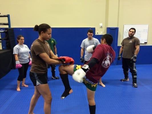 Kru Mikey demonstrates a knee strike from the art of Muay Thai aka Thai Boxing.