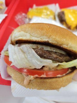 Hamburger with whole grilled onion