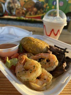 Mofongo with steak and shrimp and a piñacolada