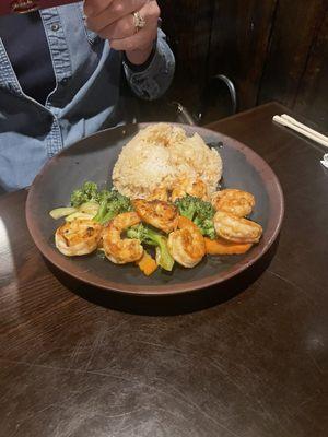 Gluten free shrimp with fried rice and vegetables.