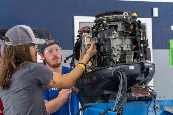 New students in our Yamaha Marine Maintenance Certification Program learn about the ins and out of a Yamaha engine.