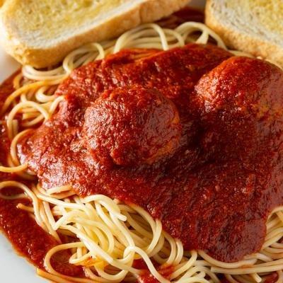 Spaghetti with Meatballs - - perfectly cooked noodles, covered with Scorno's Pasta Sauce (or try it with our delicious Meat Sauce!)