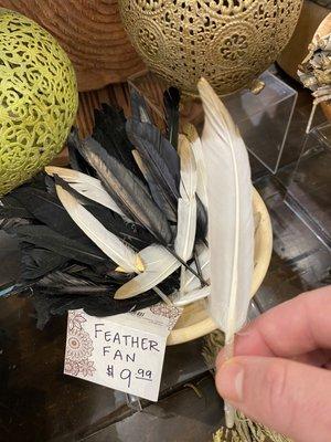 "Feather fan" for $10. If you bought three of them you might almost have enough to fan yourself for the $30 you just blew.